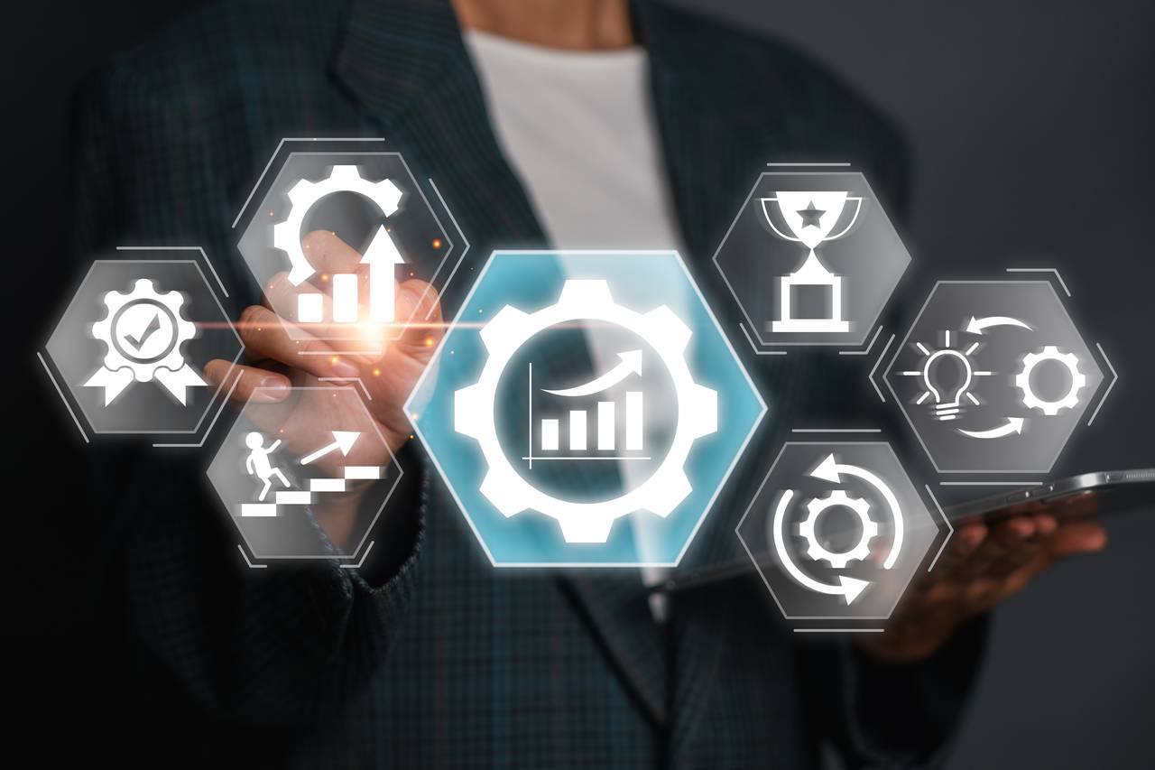 Businessman using digital interface to apply Kaizen concept for continuous improvement and efficiency in business processes. futureconfiguration